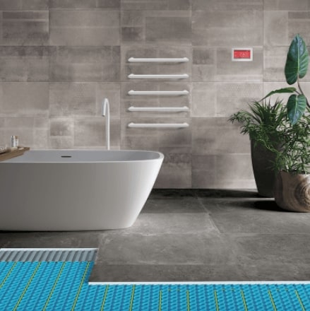 Underfloor heating with bathtub in the background